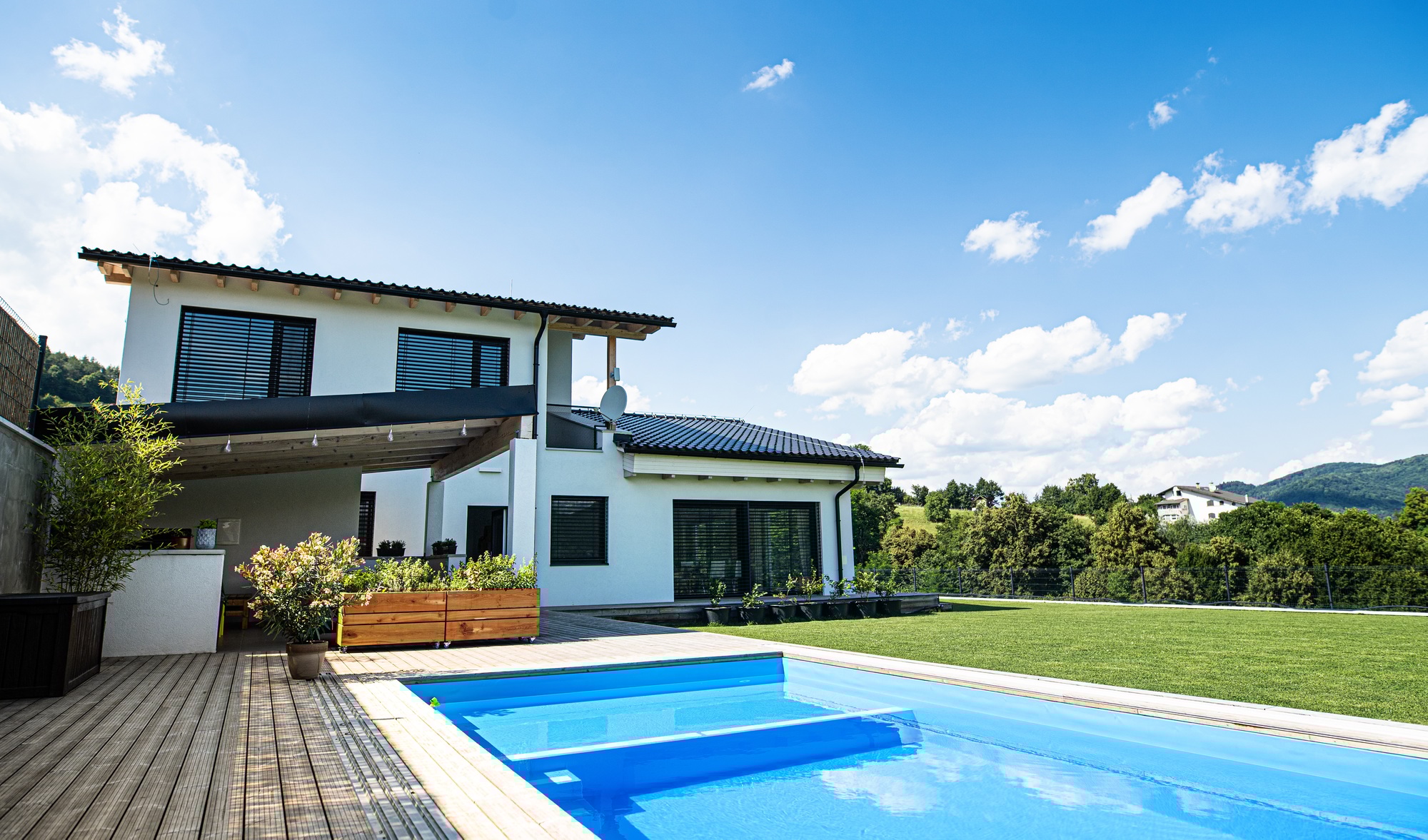 House with swimming pool outdoors in backyard garden